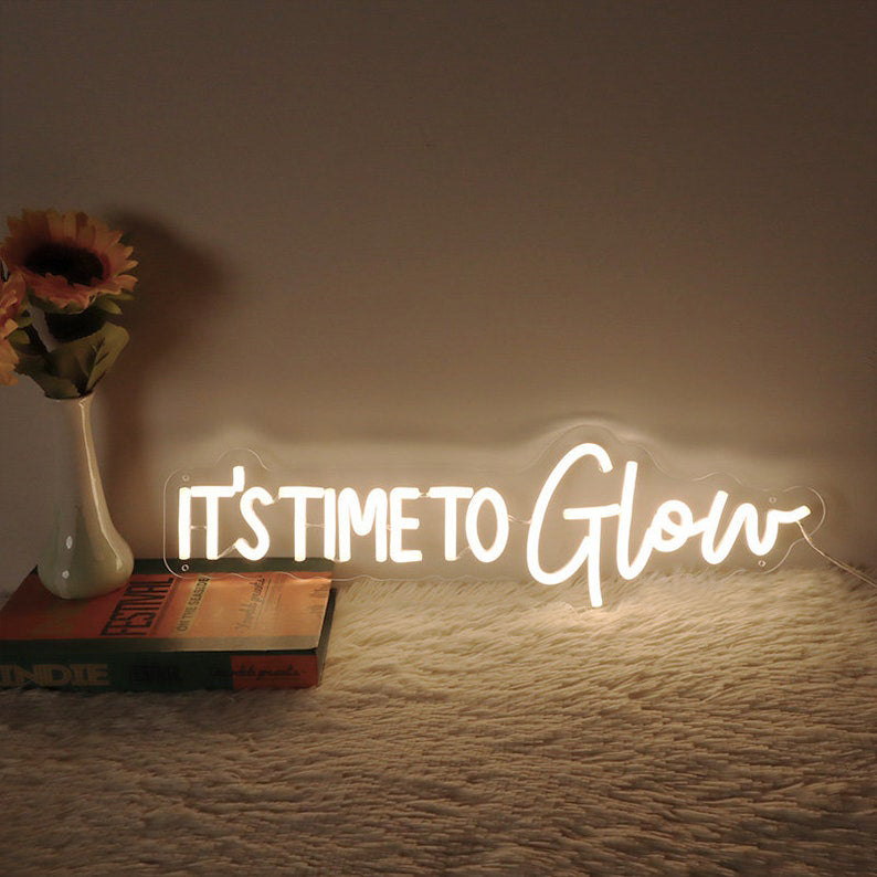 It's Time to Glow Neon, Neon sign, Beauty salon decor, Illuminated sign, Glow-themed salon, Vibrant lighting, Stylish ambiance, Trendy neon sign, Chic beauty studio, Salon atmosphere, Glow-up vibes.